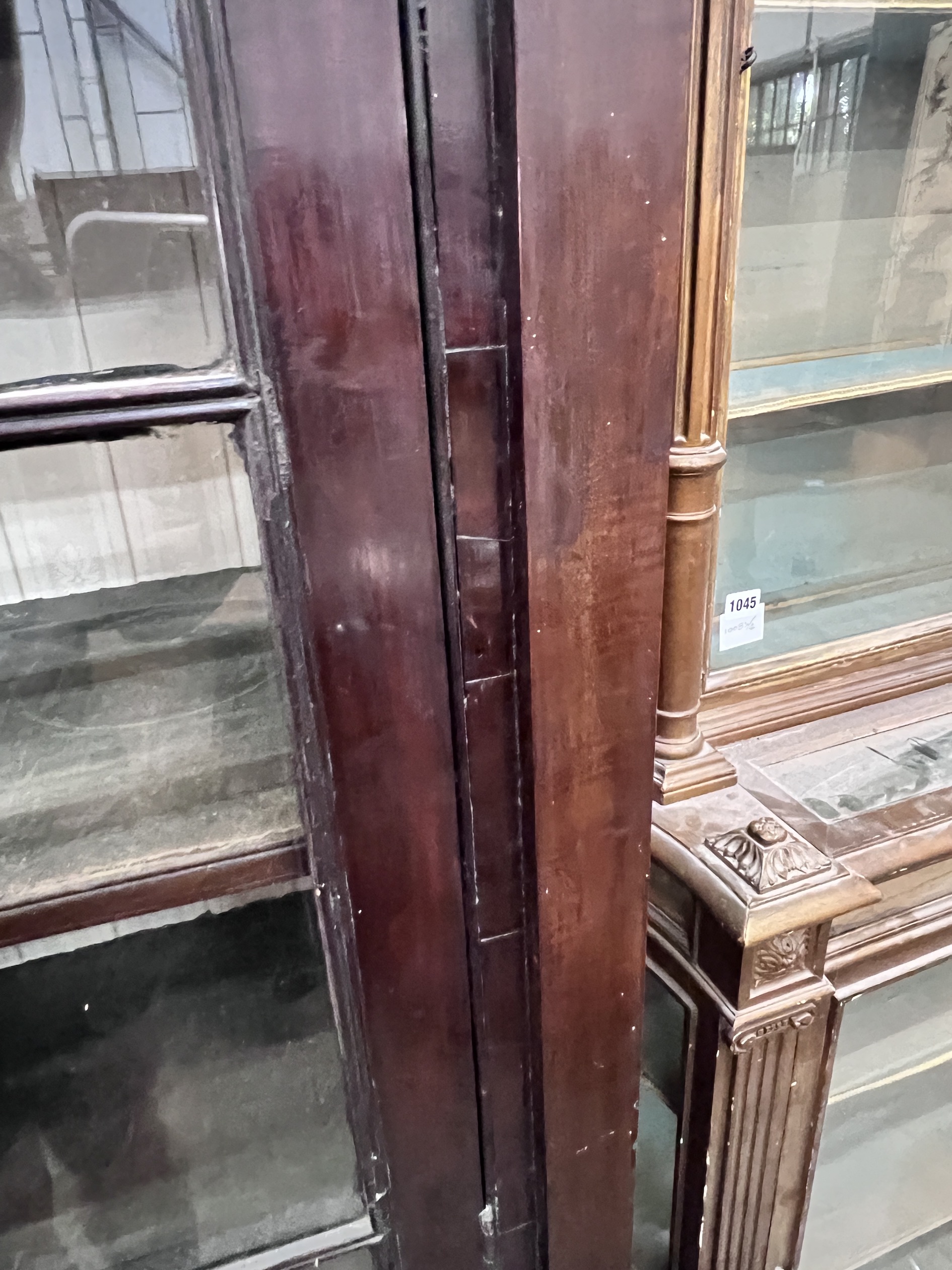 A tall mahogany glazed cabinet, width 66cm, depth 38cm, height 190cm